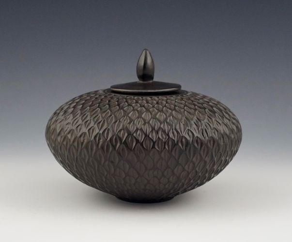 Carved Smoke fired Lidded Vessel